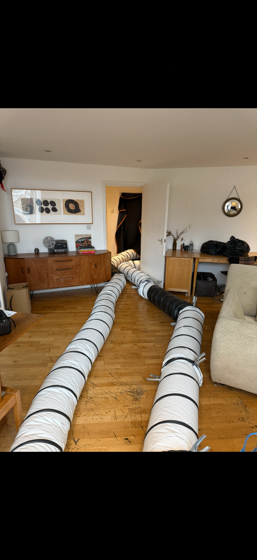 Ducting routed through a living room
