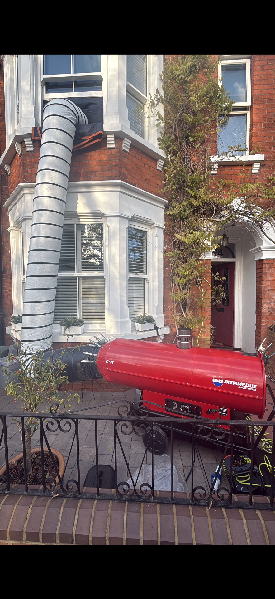 EC85 heater set up on a London terrace