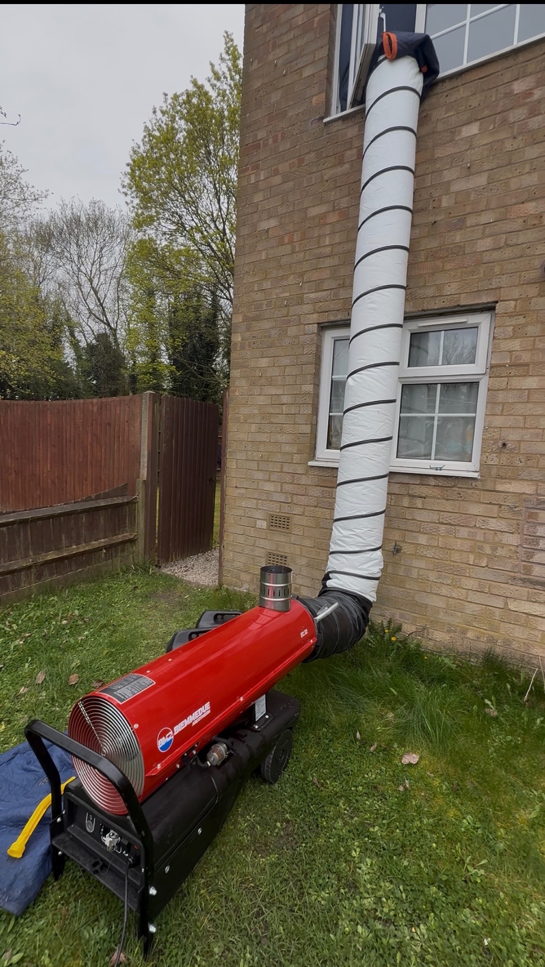 Heat treatment ducting on side of property